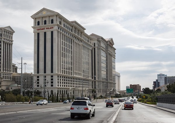 Exterior view of Caesars Palace on the Las Vegas Strip with fountains in the foreground